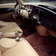 Illustration for article titled Aston Martin Once Built a Superluxury Sedan Concept Off a Lincoln Town Car